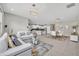 Open floor plan living room that flows into the kitchen and dining areas at 3454 Somerset Park Dr # 36, Orlando, FL 32824
