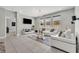 Bright living room features a large window and space for relaxing at 3454 Somerset Park Dr # 36, Orlando, FL 32824