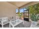 Relaxing screened patio with stylish furniture and views of the landscaped backyard at 3454 Somerset Park Dr # 36, Orlando, FL 32824