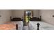 Bedroom with two antique twin beds with patterned bedding and a window view at 4051 Crofford Ave, Haines City, FL 33844
