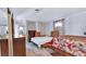 Spacious bedroom featuring two beds, neutral walls and wood-look flooring at 4051 Crofford Ave, Haines City, FL 33844