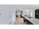 Spacious kitchen with granite counters, stainless faucet and wood-look tile at 4051 Crofford Ave, Haines City, FL 33844