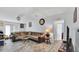 Open-concept living room with tile flooring, and comfortable seating for entertaining guests at 4051 Crofford Ave, Haines City, FL 33844