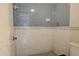Bathroom showcasing blue and white tile in shower and vintage hardware at 422 S Hawthorn Cir, Winter Springs, FL 32708