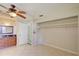 Bright bedroom features a ceiling fan, closet, and neutral paint creating a comfortable living space at 422 S Hawthorn Cir, Winter Springs, FL 32708