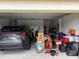 Spacious garage featuring ample storage, accommodating vehicles and household items at 5118 Laval Dr, Orlando, FL 32839
