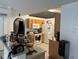 A kitchen with wood cabinets, stainless steel appliances, and tiled floors at 5118 Laval Dr, Orlando, FL 32839