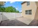 Paver patio and white fence in backyard at 5669 New Independence Pkwy, Winter Garden, FL 34787