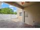 Covered outdoor patio with ceiling fan, brick pavers, and door to house at 5669 New Independence Pkwy, Winter Garden, FL 34787