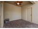 Covered paver patio with ceiling fan, a door, and room for activities at 5669 New Independence Pkwy, Winter Garden, FL 34787