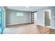 Spacious bedroom with sliding glass doors and a decorative sliding barn door at 5938 Marlberry Dr, Orlando, FL 32819