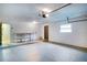 Spacious garage featuring a workbench and access to an interior room at 5938 Marlberry Dr, Orlando, FL 32819