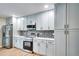 Recently remodeled kitchen featuring stainless steel appliances, stylish backsplash, and updated cabinets with modern fixtures at 5938 Marlberry Dr, Orlando, FL 32819