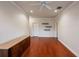 Spacious bedroom features hardwood floors, a ceiling fan, recessed lighting, and ample closet space at 6138 Greatwater Dr, Windermere, FL 34786