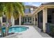Backyard featuring a large pool and patio area great for entertaining in this beautiful home at 6138 Greatwater Dr, Windermere, FL 34786