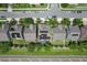 Top-down aerial of homes with solar panels and private pools, nestled in a vibrant neighborhood at 617 Marsh Reed Dr, Winter Garden, FL 34787