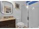 Bathroom featuring a vanity with granite top, white toilet and a glass enclosed shower at 617 Marsh Reed Dr, Winter Garden, FL 34787