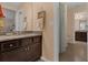 Bright bathroom view of a vanity with granite countertops at 617 Marsh Reed Dr, Winter Garden, FL 34787
