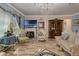 Elegant formal living room with ornate chandelier and matching furniture at 617 Marsh Reed Dr, Winter Garden, FL 34787
