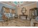 Formal living area with tiled floors, columns, chandelier, and light blue and tan walls at 617 Marsh Reed Dr, Winter Garden, FL 34787