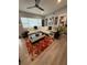 Spacious living room features hardwood floors and a stylish sectional sofa at 740 Naples Dr, Orlando, FL 32804