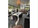 Inviting screened patio with dining and seating areas, ideal for entertaining at 740 Naples Dr, Orlando, FL 32804