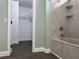 Bathroom showcasing tub-shower, walk-in closet and modern flooring at 8414 Sw 136Th Pl, Ocala, FL 34473