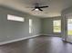 Large bedroom with modern flooring, natural light and neutral paint at 8414 Sw 136Th Pl, Ocala, FL 34473