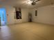 Large garage with epoxy flooring and additional storage, with access to the home at 8414 Sw 136Th Pl, Ocala, FL 34473