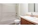 Clean bathroom with tub-shower combo and vanity with sink; all in a well-lit space at 85 Levee Ln, Ormond Beach, FL 32174