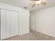 Neutral bedroom with a closet and a ceiling fan at 85 Levee Ln, Ormond Beach, FL 32174