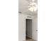 Bright bedroom featuring a ceiling fan, carpet floors, and an open closet at 85 Levee Ln, Ormond Beach, FL 32174