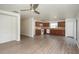 Open-concept living space featuring updated floors connecting living and dining area at 85 Levee Ln, Ormond Beach, FL 32174