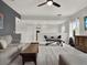 Bright bonus room with neutral colors, equipped for exercise, and offering comfortable seating for relaxation at 8665 Pinter St, Orlando, FL 32827