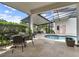 Screened-in pool and patio area perfect for entertaining and enjoying outdoor living at 8665 Pinter St, Orlando, FL 32827