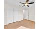 Neutral bedroom featuring wall to wall carpeting, ceiling fan, and closet at 910 Amy Ridge Ct, Kissimmee, FL 34747