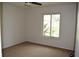 Bedroom with carpet, neutral walls, and a large window allowing natural light at 910 Amy Ridge Ct, Kissimmee, FL 34747