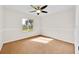 Bedroom with carpet flooring, neutral walls, and ceiling fan at 910 Amy Ridge Ct, Kissimmee, FL 34747