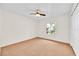 Bedroom with carpet flooring, neutral walls, and ceiling fan at 910 Amy Ridge Ct, Kissimmee, FL 34747