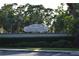Indian Ridge Homeowners Association community sign on Indian Ridge Trail South, surrounded by mature trees and landscaping at 910 Amy Ridge Ct, Kissimmee, FL 34747