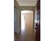 Inviting entryway featuring neutral walls, tiled flooring and arched doorways creating a warm welcome to the home at 910 Amy Ridge Ct, Kissimmee, FL 34747