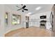 Bright kitchen features white cabinets, stainless steel appliances, and tile flooring at 910 Amy Ridge Ct, Kissimmee, FL 34747