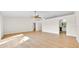 Open living room with tile floors, archways, and neutral paint at 910 Amy Ridge Ct, Kissimmee, FL 34747