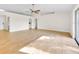 Spacious living room with high ceilings, tile floors, and ample natural light at 910 Amy Ridge Ct, Kissimmee, FL 34747