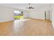 Open living room with tile floors and sliding glass doors to backyard at 910 Amy Ridge Ct, Kissimmee, FL 34747