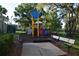 Community playground with benches, mulch ground cover, and a safe environment for  at 910 Amy Ridge Ct, Kissimmee, FL 34747