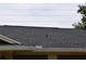 Durable roof featuring new shingles and seamless gutters to protect the property from water damage at 910 Amy Ridge Ct, Kissimmee, FL 34747