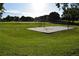 Sand volleyball court with a grassy field at 910 Amy Ridge Ct, Kissimmee, FL 34747