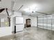 Large garage with storage cabinets and updated lighting at 9376 Se 175Th Pompion St, The Villages, FL 32162