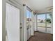 Cozy sunroom with sliding glass doors offering neighborhood views at 9376 Se 175Th Pompion St, The Villages, FL 32162